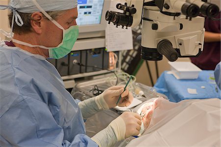 Ophthalmologist performing cataract surgery Stock Photo - Premium Royalty-Free, Code: 6105-05396728