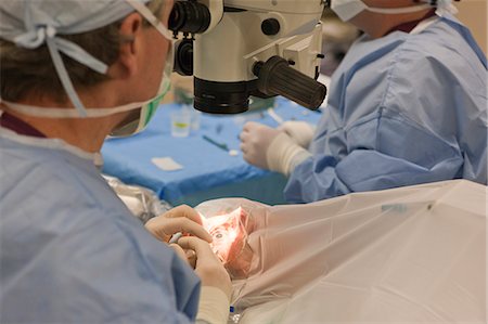 Ophthalmologist performing cataract surgery Stock Photo - Premium Royalty-Free, Code: 6105-05396730
