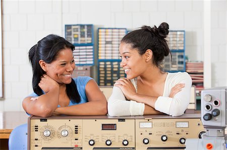 Engineering students using bench test equipment in a lab Stock Photo - Premium Royalty-Free, Code: 6105-05953754