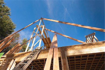 framing roof rafters - Roof rafters on home under construction Stock Photo - Premium Royalty-Free, Code: 6105-06702851