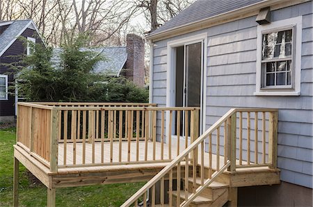 Newly constructed deck on residential home Stock Photo - Premium Royalty-Free, Code: 6105-06702967