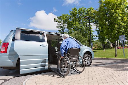 Man with muscular dystrophy and diabetes getting in an accessible van Stock Photo - Premium Royalty-Free, Code: 6105-06702978