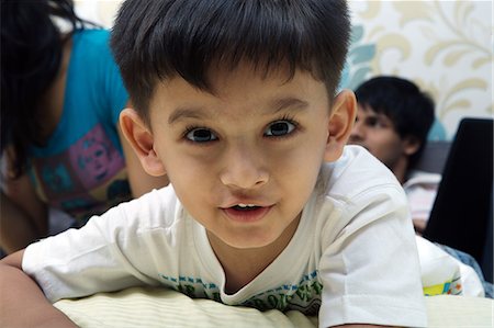 simsearch:6107-06117573,k - Little boy on a bed Stock Photo - Premium Royalty-Free, Code: 6107-06117593