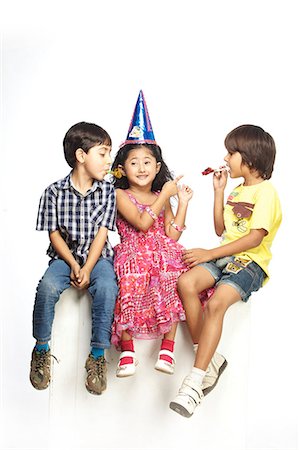 Portrait of three children Stock Photo - Premium Royalty-Free, Code: 6107-06117770