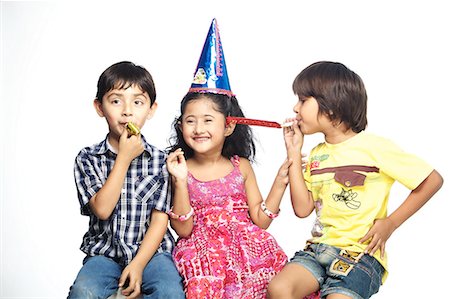 Portrait of three children Stock Photo - Premium Royalty-Free, Code: 6107-06117771