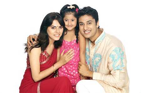 east indian mother and children - Parents avec fille souriant Photographie de stock - Premium Libres de Droits, Code: 6107-06117847