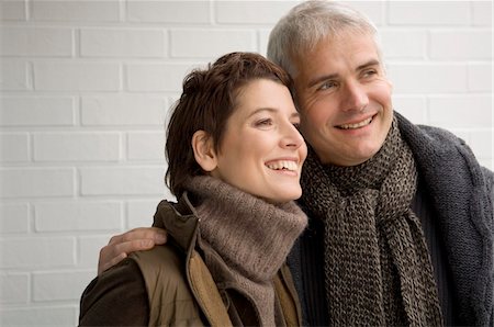 simsearch:6108-05859747,k - Close-up of a mature man and a mid adult woman smiling Stock Photo - Premium Royalty-Free, Code: 6108-05859940