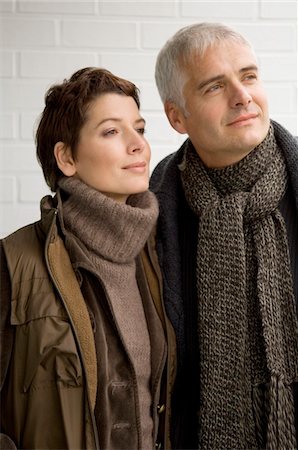 simsearch:6108-05859747,k - Close-up of a mature man and a mid adult woman standing together Stock Photo - Premium Royalty-Free, Code: 6108-05859948