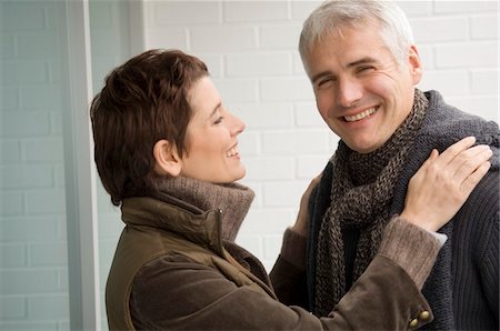 simsearch:6108-05859747,k - Mature man and a mid adult woman smiling Stock Photo - Premium Royalty-Free, Code: 6108-05859922