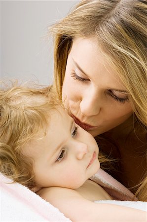 simsearch:6108-05860153,k - Close-up of a young woman kissing her son Stock Photo - Premium Royalty-Free, Code: 6108-05860163