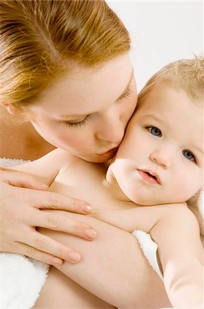 simsearch:6108-05860153,k - Close-up of a young woman kissing her son Stock Photo - Premium Royalty-Free, Code: 6108-05860166