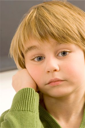 simsearch:6108-05863386,k - Close-up of a boy thinking Stock Photo - Premium Royalty-Free, Code: 6108-05860293