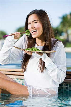 simsearch:6108-05861651,k - Woman eating seaweed with chopsticks Stock Photo - Premium Royalty-Free, Code: 6108-05861679