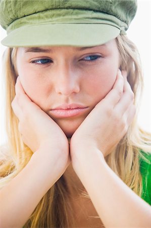 simsearch:6108-05863386,k - Close-up of a woman looking disappointed Stock Photo - Premium Royalty-Free, Code: 6108-05861815