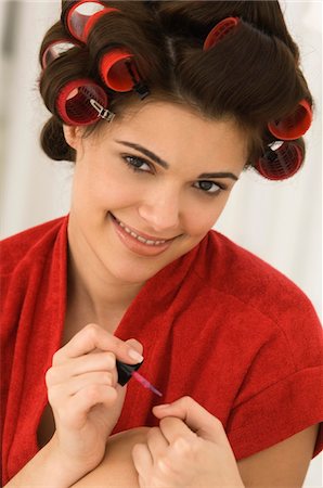simsearch:6108-05863589,k - Close-up of a woman painting finger nails Foto de stock - Sin royalties Premium, Código: 6108-05862284