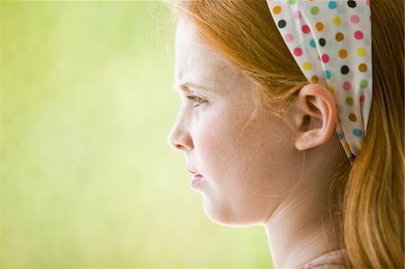 simsearch:6108-05863386,k - Close-up of a girl thinking Stock Photo - Premium Royalty-Free, Code: 6108-05863071
