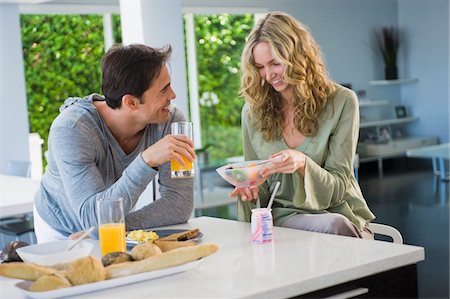 simsearch:6108-05861651,k - Couple at the breakfast table Stock Photo - Premium Royalty-Free, Code: 6108-05863264
