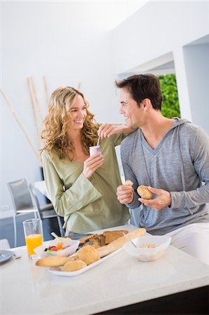 simsearch:6108-05861651,k - Couple at the breakfast table Stock Photo - Premium Royalty-Free, Code: 6108-05863273