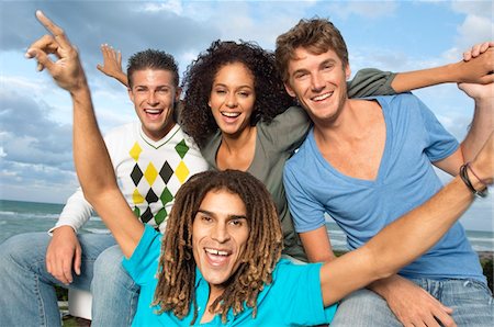 sea group fun - Portrait of four friends looking cheerful Stock Photo - Premium Royalty-Free, Code: 6108-05863627