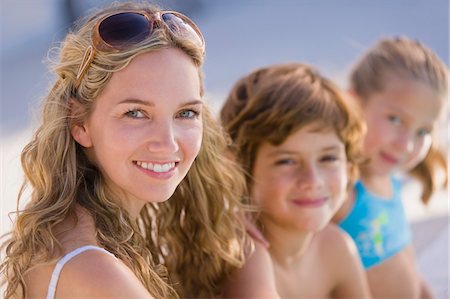 Portrait of a woman smiling Stock Photo - Premium Royalty-Free, Code: 6108-05863837