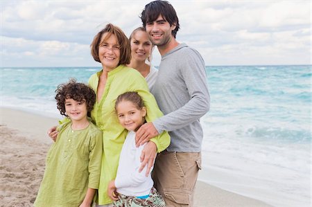 sea group fun - Family on the beach Stock Photo - Premium Royalty-Free, Code: 6108-05864062