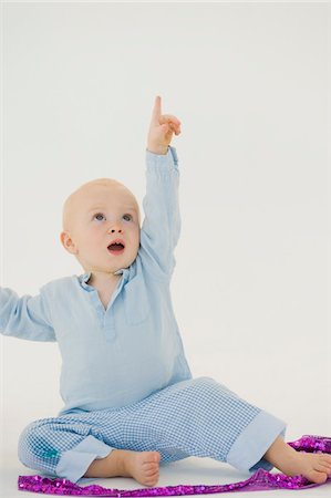 simsearch:6108-05865577,k - Baby boy pointing upward Stock Photo - Premium Royalty-Free, Code: 6108-05865643