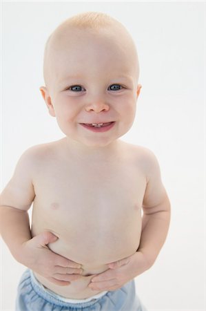 simsearch:6108-05865577,k - Portrait of a baby boy smiling Stock Photo - Premium Royalty-Free, Code: 6108-05865641