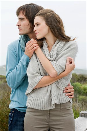 simsearch:6108-05859747,k - Couple standing together and holding each other's hand Stock Photo - Premium Royalty-Free, Code: 6108-05866232