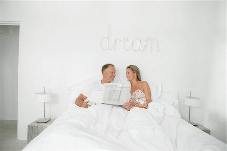 simsearch:6108-05856772,k - Couple on the bed Stock Photo - Premium Royalty-Free, Code: 6108-05866626