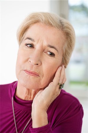 simsearch:6108-06167824,k - Close-up of a woman suffering from a toothache Stock Photo - Premium Royalty-Free, Code: 6108-05867271