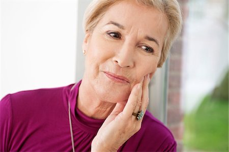 simsearch:6108-06167824,k - Close-up of a woman suffering from a toothache Stock Photo - Premium Royalty-Free, Code: 6108-05867301
