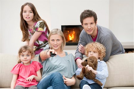 simsearch:649-07239830,k - Family watching television Stock Photo - Premium Royalty-Free, Code: 6108-05867404