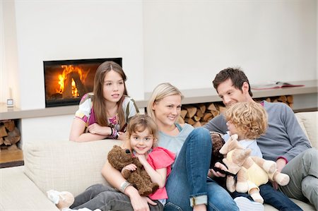 Family watching television Stock Photo - Premium Royalty-Free, Code: 6108-05867671