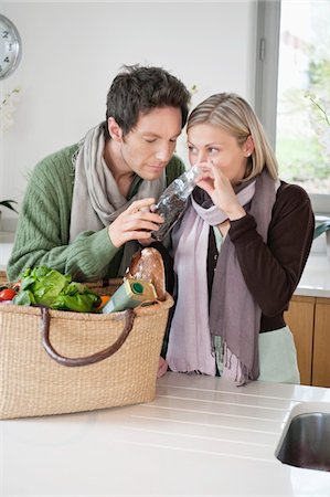 simsearch:6108-05874623,k - Couple smelling food Stock Photo - Premium Royalty-Free, Code: 6108-05867626