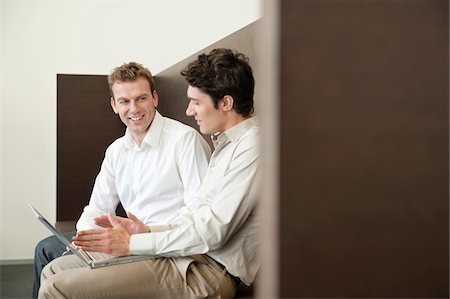 person in office cubicle - Two businessmen working in an office Stock Photo - Premium Royalty-Free, Code: 6108-05868411