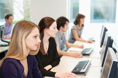 person desktop computer office - Business executives working on computers in a training class Foto de stock - Sin royalties Premium, Código: 6108-05868546