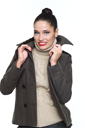 shirt collar - Young woman holding jacket collar Stock Photo - Premium Royalty-Free, Code: 6108-05868925