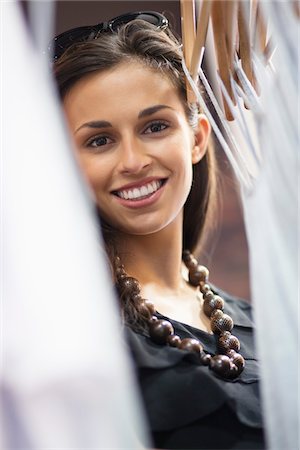 south africa and clothing store - Portrait of a young woman shopping Stock Photo - Premium Royalty-Free, Code: 6108-05870047