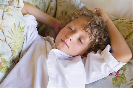 Little boy sleeping on couch Stock Photo - Premium Royalty-Free, Code: 6108-05870617