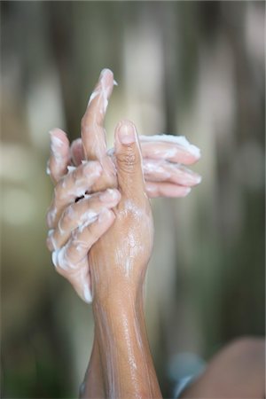 simsearch:6108-05872743,k - Close-up of a woman's hands with soap sud while bathing Stock Photo - Premium Royalty-Free, Code: 6108-05870750