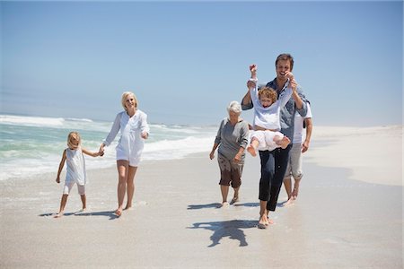 parents grandparents with kids playing outdoor - Family enjoying on the beach Stock Photo - Premium Royalty-Free, Code: 6108-05870816