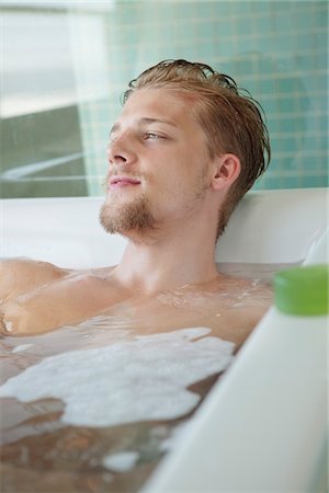 soapsuds - Man relaxing in a bathtub Stock Photo - Premium Royalty-Free, Code: 6108-05871050