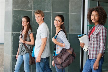 Portrait of university students standing in campus Stock Photo - Premium Royalty-Free, Code: 6108-05871350