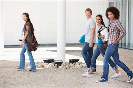 profile of man walking - University students walking in a campus Stock Photo - Premium Royalty-Free, Code: 6108-05871313