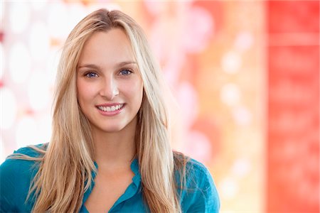 pretty human face frontal view - Portrait of a beautiful woman smiling Stock Photo - Premium Royalty-Free, Code: 6108-05871451