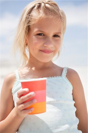 simsearch:6108-07969525,k - Portrait of a girl holding glass Stock Photo - Premium Royalty-Free, Code: 6108-05871567