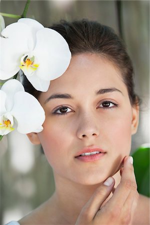 simsearch:6108-05872743,k - Portrait of a beautiful young woman with flowers Stock Photo - Premium Royalty-Free, Code: 6108-05871726