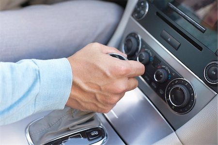 dashboard - Man shifting automatic car gear Stock Photo - Premium Royalty-Free, Code: 6108-05872259