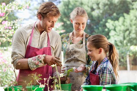 plantation - Parents and daughter gardening Stock Photo - Premium Royalty-Free, Code: 6108-05872629