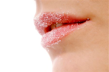 sugar - Close-up of a woman's lips covered with sugar Stock Photo - Premium Royalty-Free, Code: 6108-05873635
